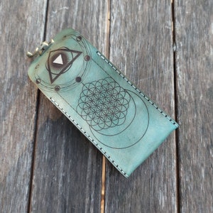 Moon Phase Handmade Leather Tarot Case. Premium leather tarot deck box in moonlight blue - sacred geometry, lunar motif, & eye of providence