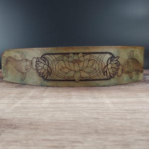 Handmade Leather Guitar Strap - Blue Lotus & Koi Fish. Hand crafted with thick premium leather. Fully adjustable sizing for custom height