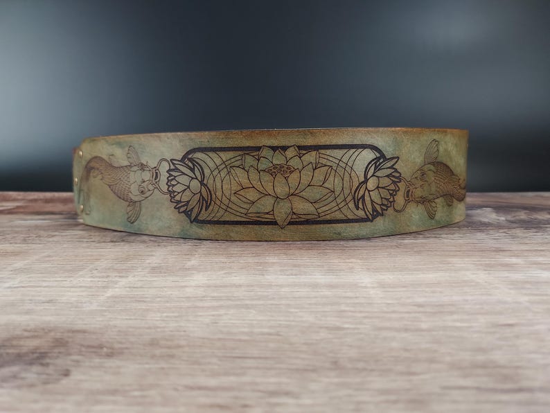 Handmade Leather Guitar Strap - Blue Lotus & Koi Fish. Hand crafted with thick premium leather. Fully adjustable sizing for custom height
