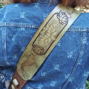 Handmade Leather Guitar Strap - Blue Lotus & Koi Fish. Hand crafted with thick premium leather. Fully adjustable sizing for custom height