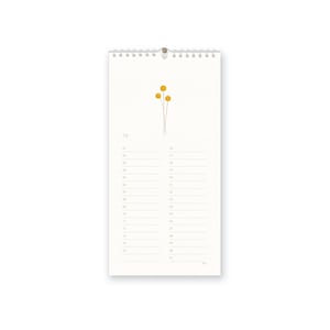 Pu&ograve; includere: Un calendario bianco con un design semplice che presenta un piccolo gruppo di fiori gialli. Il calendario &egrave; per ottobre e ha 31 giorni.