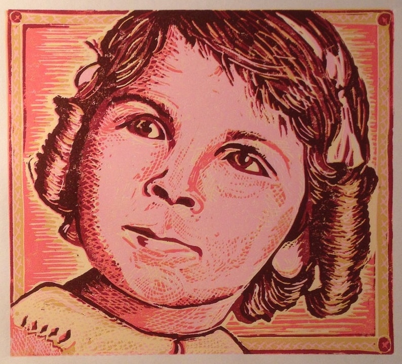 May include: A close-up portrait of a young girl with brown hair, wearing a light yellow shirt. The image is a woodblock print with a pink and yellow background.