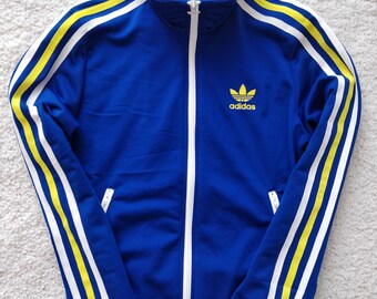 yellow adidas jacket with black stripes