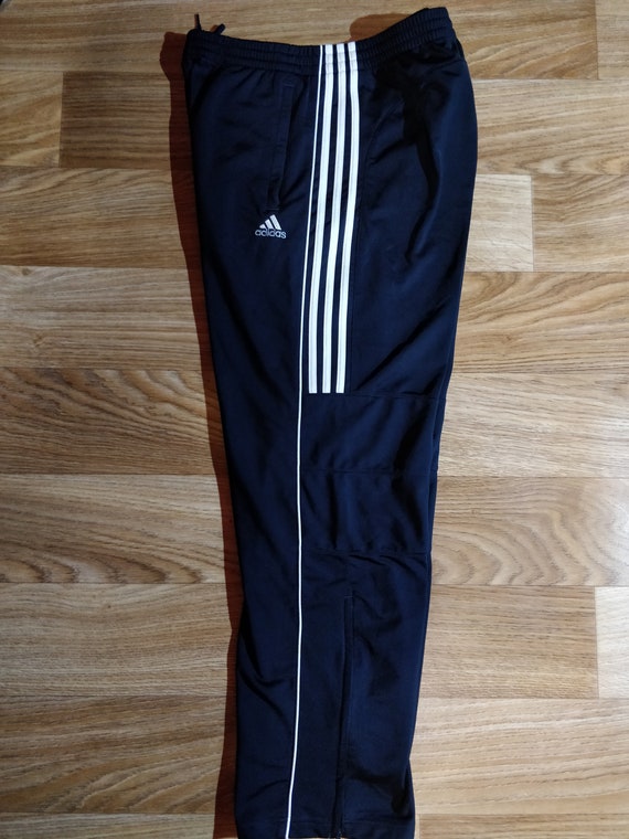 navy blue adidas track suit