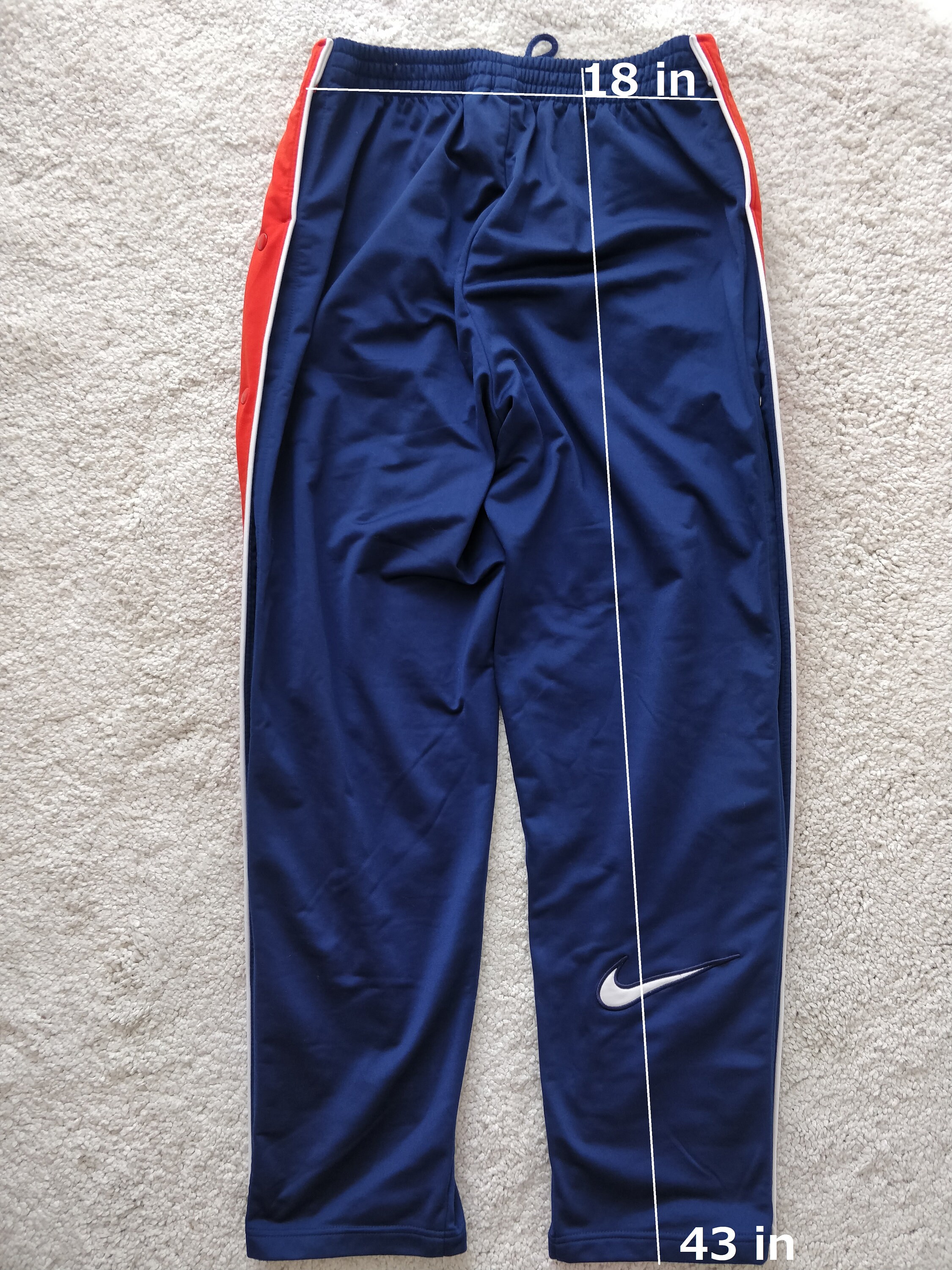 nike men's track pants with zipper legs
