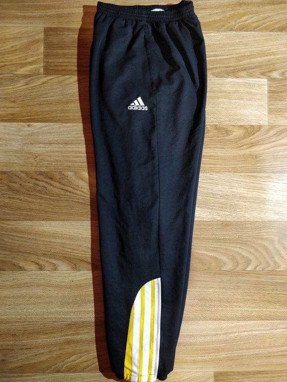 black and yellow adidas pants