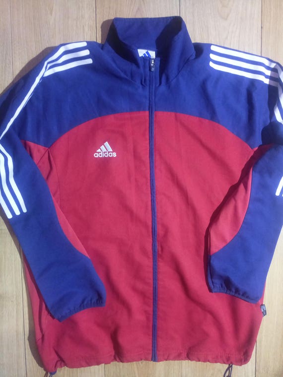 Buy > adidas navy tracksuit top > in stock