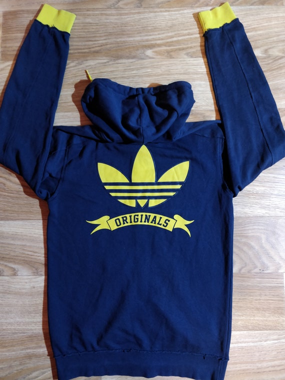 navy blue and yellow adidas tracksuit