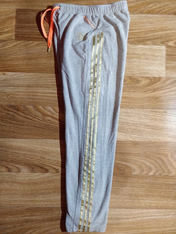 grey and gold adidas tracksuit