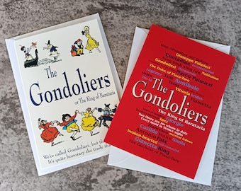 May include: Two rectangular greeting cards featuring The Gondoliers or The King of Barataria. One card is cream with colorful illustrations of characters and text. The other is red with dense black, yellow, and blue text listing names and phrases.