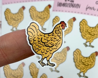 May include: A sheet of stickers featuring illustrations of Orpington chickens. The stickers are printed on white paper with pink text that reads "Orpington from my coop to yours" and "FarmhouseMaven".