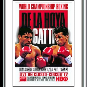 May include: A poster advertising a boxing match between Oscar De La Hoya and  Joey  Gatti. The poster is red and white with the text "WORLD CHAMPIONSHIP BOXING" and "DE LA HOYA Gatti" in large black letters. The poster also includes the date and time of the fight, as well as the television channel it will be broadcast on.