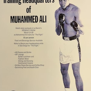 May include: A vintage poster advertising Le Baron Hotels in San Diego, California. The poster features a photo of Muhammad Ali in boxing gear, with the text "Welcome Fight Fans to the Training Headquarters of MUHAMMED ALI" at the top. The poster also includes information about the hotel's amenities, including rooms, suites, a VIP lounge, dining, and a swimming pool.