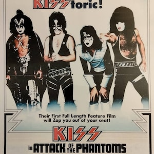 May include: A movie poster for the 1978 film "KISS Meets the Phantom of the Park" featuring the band KISS in their signature makeup. The poster features the text "KISSterical! KISStounding! KISStoric!" and "Their First Full Length Feature Film will Zap you out of your seat!"  The poster is in a blue and white color scheme.