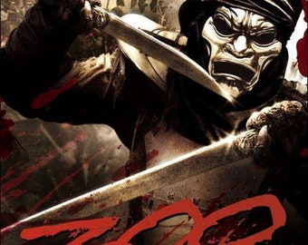 May include: A movie poster for the film "300" featuring a warrior in a helmet and holding a sword. The poster is red, black, and white with the text "Pledged to Crush" and "300" in large, bold letters.