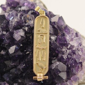 18k solid Gold Cartouche (Available one side or 2 sides) Available in Hieroglyphic, Arabic or English Letters. Elegant handmade Cartouche
