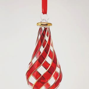 Egyptian Blown Glass Ornament clear with golden swirls (various colors). Created by professional craftsmen. Nice touch around you.