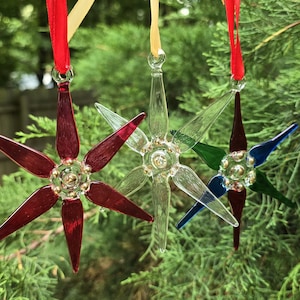 Wonderful Egyptian Blown Glass Ornament colored star available in two shapes. Handmade by skilled Crafts for you. Decorate all your areas by