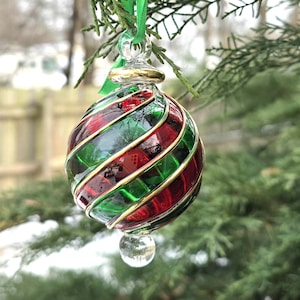 Wonderful Egyptian Blown Glass Ornament (blue -red-green) swirl design with gold accent. Handmade by craftsmen suitable for all areas .