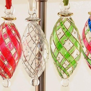 Magnificent Egyptian handmade Blown Glass Ornament clear with golden swirls (various colors). Made by professional for you .
