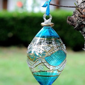 Wonderful Egyptian Blown Glass Ornament – clear (green/pink/blue /purple/light blue) oval drop with gold design