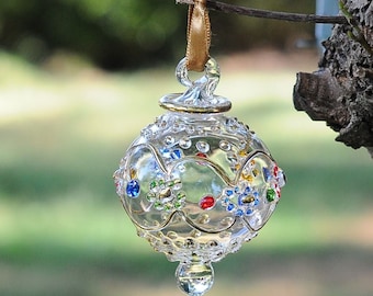 Egyptian Blown Glass Ornament –A clear designs with small colored  flower with golden accent