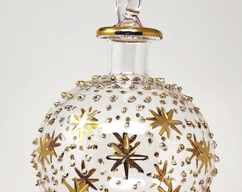 Wonderful Egyptian Blown Glass Ornament- A small oval ball with golden stars and dots create  A nice touch around you from Egypt with love