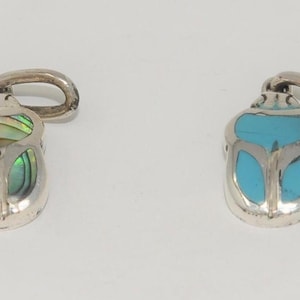 925 sterling silver scarab pendants with different stones, it is an amazing piece of Art From our professional workshop in Cairo.
