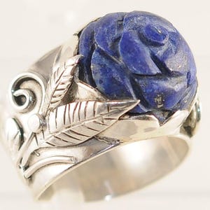 Blue lapis stone carved into a rose incased in .925 sterling silver ring vine and leaf design made in our old workshop in old Cairo