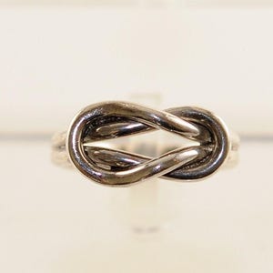 925 Sterling Silver double loop knot ring .By professional craftsmen created in our workshop  Khan El Khalili old Cairo.
