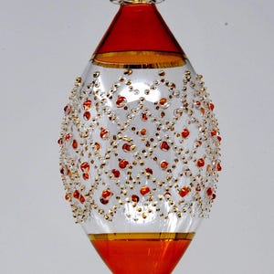 Amazing Egyptian Blown Glass Ornament – oval shape with dots and golden accents. Unique shape decorate your indoor & outdoor areas