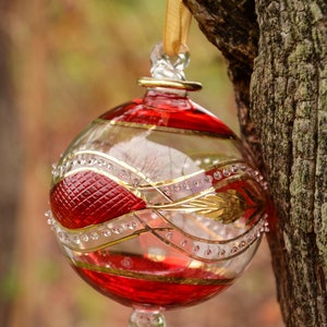 Wonderful Egyptian Blown Glass Ornament- a golden accent with gold leaf. Create a nice mood around you.