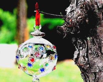 Egyptian Blown Glass Ornament- clear with multi colors dotted. Handmade by professional to create nice touch in your area
