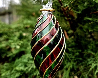 Magnificent Egyptian handmade Blown Glass Ornament clear with golden swirls (various colors). Made by professional for you .