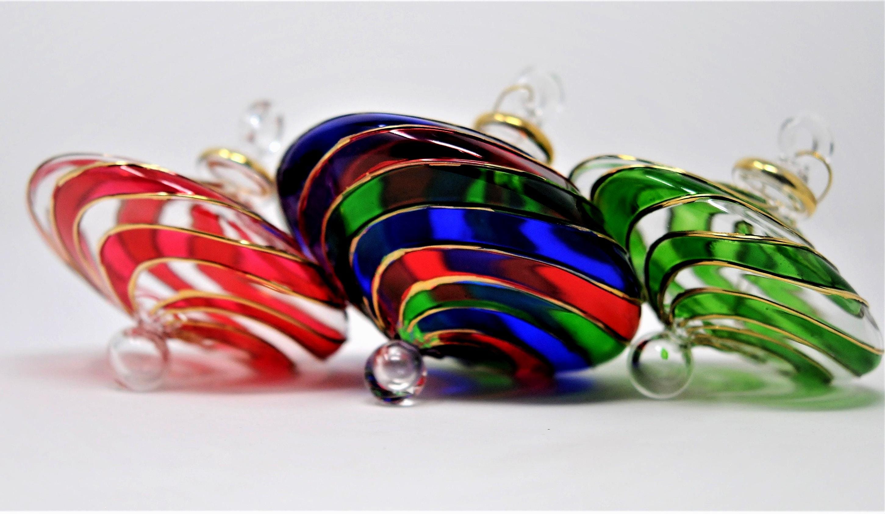 Wonderful Egyptian Blown Glass Ornament Clear with golden accents and swirls. Handmade by craftsmen. Make a nice mood around you