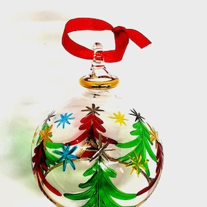 Magnificent Egyptian handmade Blown Glass Ornament- clear with gold design and colored Christmas tree shape.