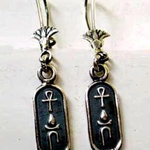 Cartouche earring with Lotus flower 925 sterling silver coming to you from our old workshop At old Cairo. Decorate your ear by lotus.