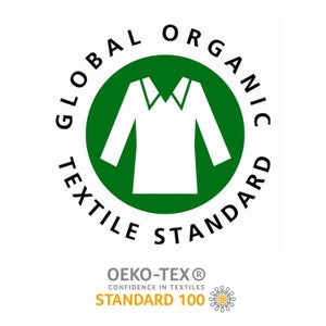 May include: A green circle with the text "GLOBAL ORGANIC TEXTILE STANDARD" around the outside. Inside the circle is a white silhouette of a long-sleeved shirt. Below the circle is the text "OEKO-TEX&reg; CONFIDENCE IN TEXTILES STANDARD 100" with a small yellow and orange graphic.