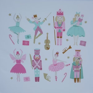 May include: A whimsical illustration featuring ballet dancers, nutcrackers, and a mouse king in pink, teal, and gold. The design includes a violin, trumpet, and wrapped gifts, evoking a festive holiday theme.