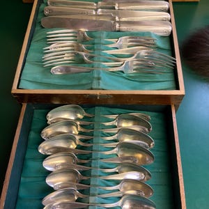 Juego de cubiertos vintage Wm. Rogers de plata bañada de 1881, modelo Chippendale, para 6 personas.