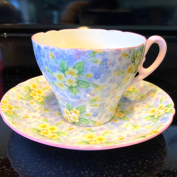 Vintage Shelley Tea Cup & Saucer # 13586 Demitasse Blue And Yellow Floral Chintz With Pink Handle And Rim English Fine Bone China