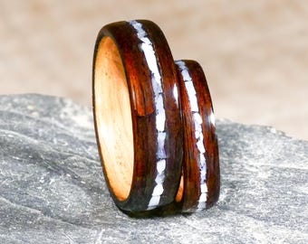 The couple's wedding bands in ebony and mother-of-pearl - wooden ring for him, for her - handmade wooden engagement ring