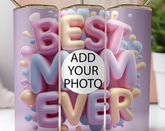 May include: Three pink, purple, and cream colored stainless steel tumblers with the words "Best Mom Ever" in a 3D bubble font. The middle tumbler has a white circle with the text "Add Your Photo".