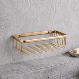 May include: A rectangular wall-mounted shower caddy with a brushed gold finish. The basket features a wire frame construction with rounded corners and two mounting points along the back edge for secure installation against a flat surface.