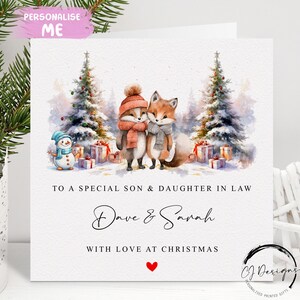 Biglietto di Natale personalizzato per figlio e nuora - con nomi, coppia di volpi, scena di Natale e cuore rosso