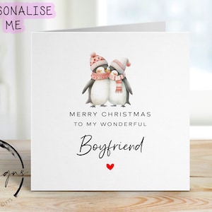 Vriendjeskerstkaart: kaart liefdevol pinguïnpaar en rood hart