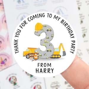 May include: A circular sticker with the text "Thank you for coming to my birthday party" around a design. The design includes a number 3 filled with construction vehicles, a yellow dumper truck, and an excavator. The text "From Harry" is below.