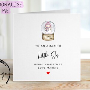 Little Sis Christmas Card - Personalised Card with Pink Theme Snowman Snow Globe