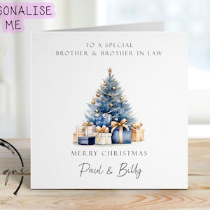 Biglietto di Natale personalizzato per fratello e cognato, tema blu e oro, alberi e regali, coppia di biglietti