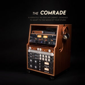 May include: A wooden 14U sidecar cabinet with wheels, designed for studio use. It features a black audio mixer with knobs and buttons, a black power strip, and a black audio interface with a digital display. The cabinet has a brown wood finish and a cutout for headphones.